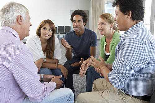small group of adults in conversation